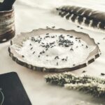 chocolate cake with white icing on white table