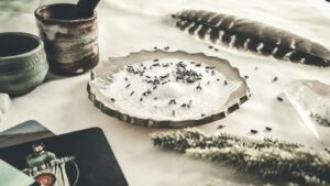 chocolate cake with white icing on white table