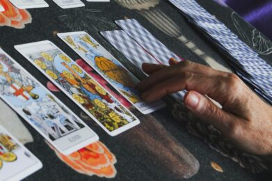 Tarot cards are being laid out for a reading