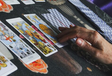 Tarot cards are being laid out for a reading