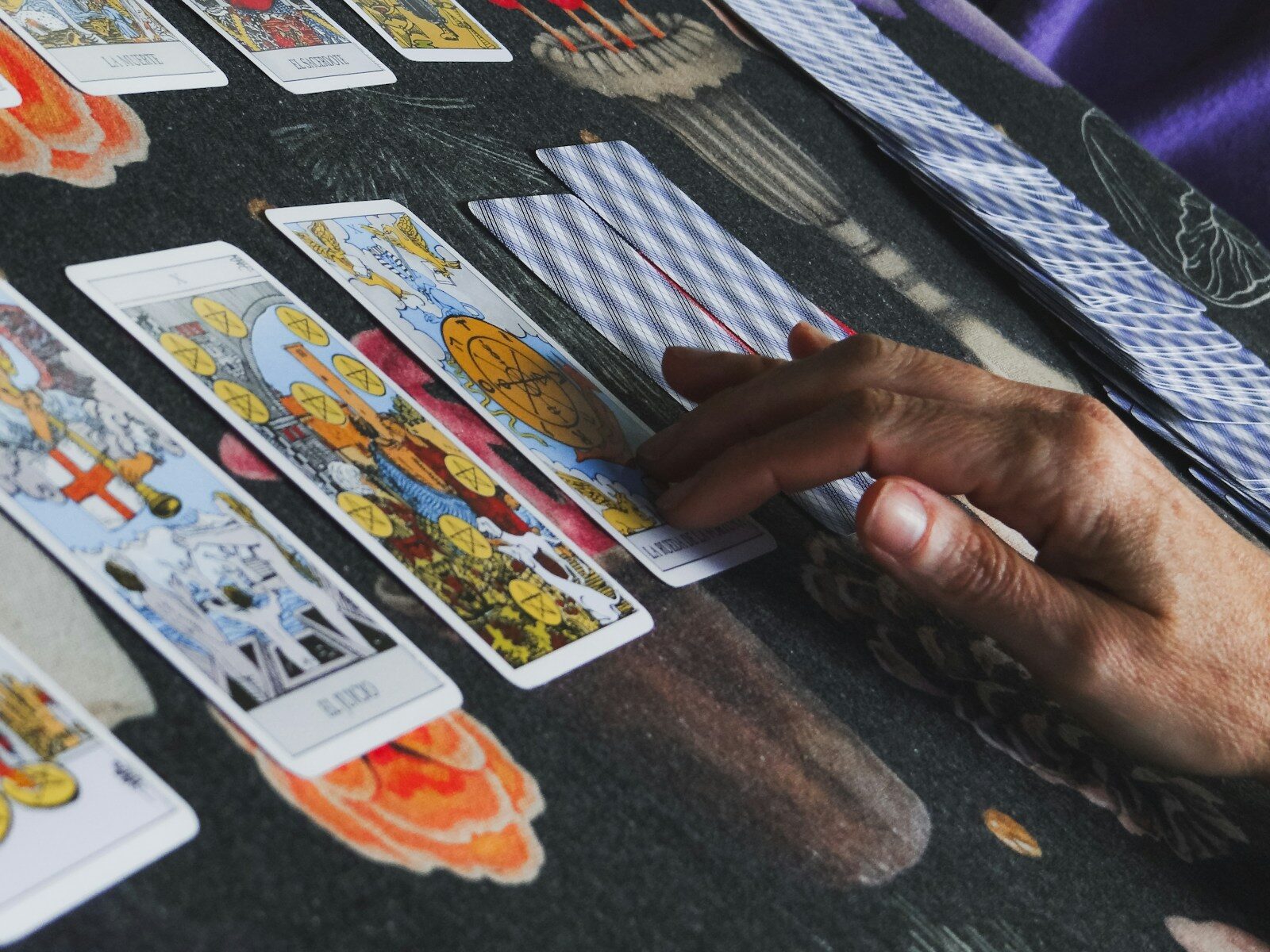 Tarot cards are being laid out for a reading